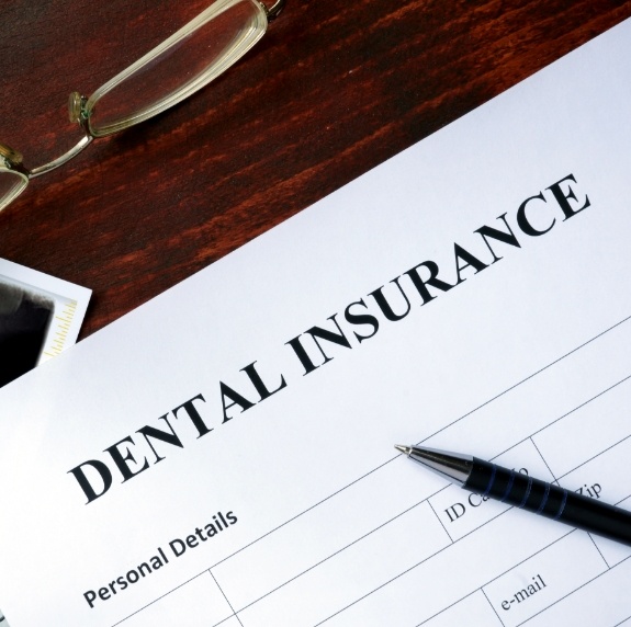 Dental insurance form on desk